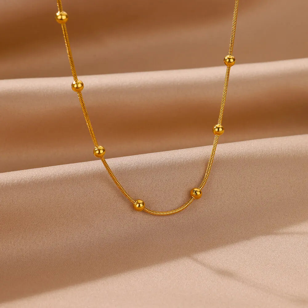 Lumelle Golden Sphere Necklace