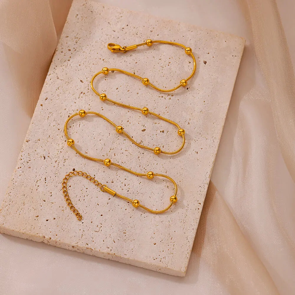 Lumelle Golden Sphere Necklace